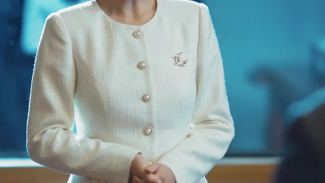 Reclaiming Her Chair: When Brooches Speak Louder Than Words