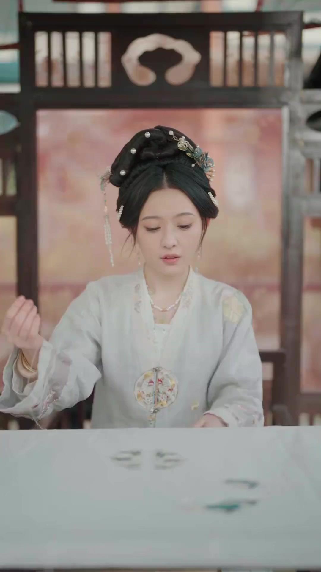 Die erste Phönix-Stickerin