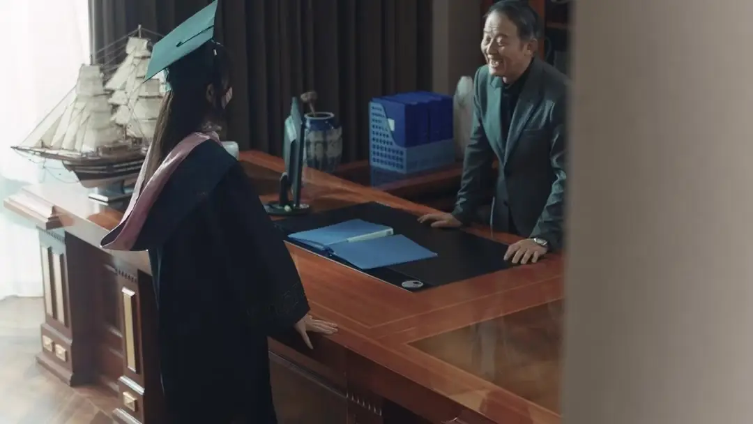 Reclaiming Her Chair: When Coats Speak Louder Than Diplomas